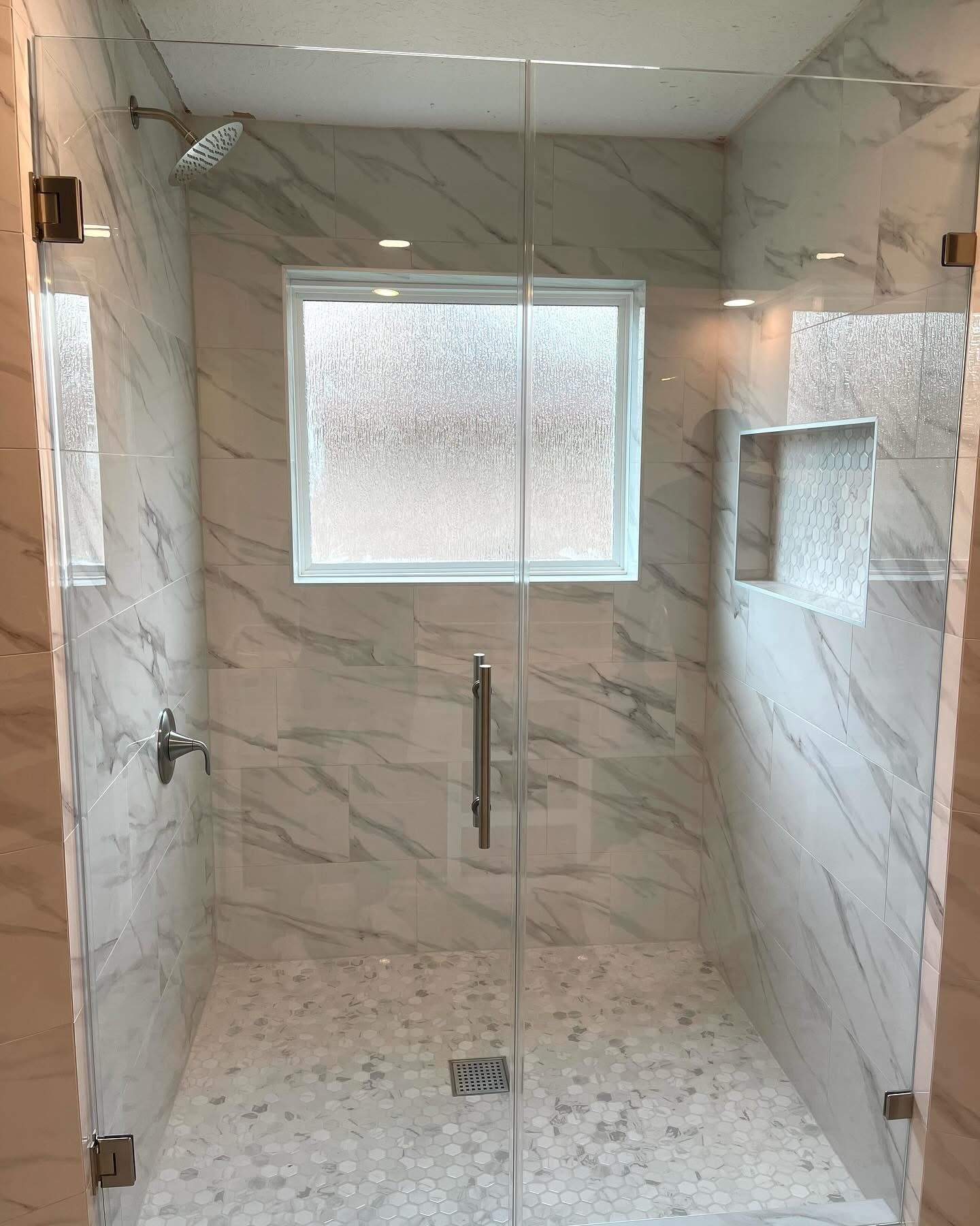 Frameless glass marble shower