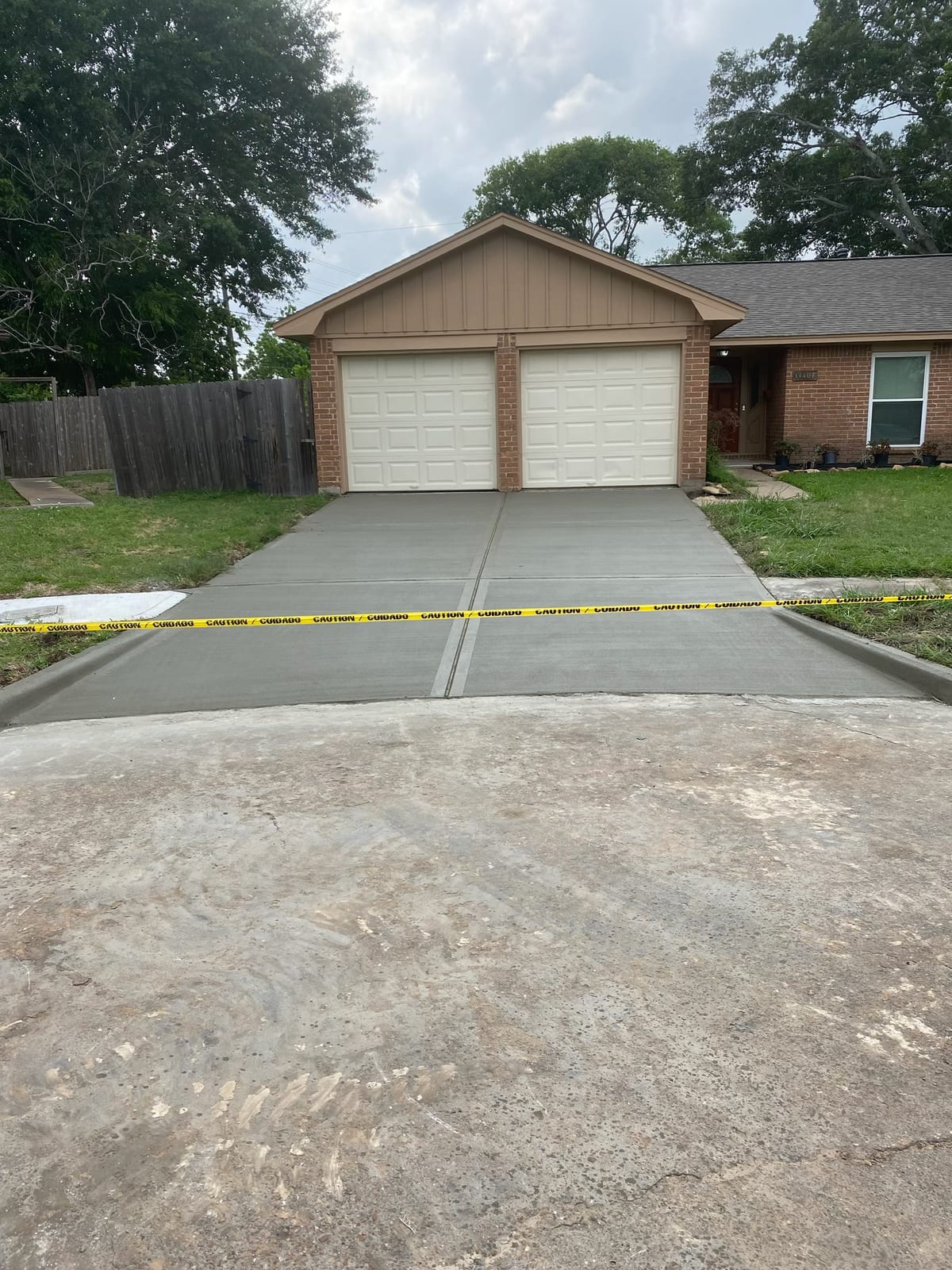 New two-car concrete driveway pour by Art & Floors